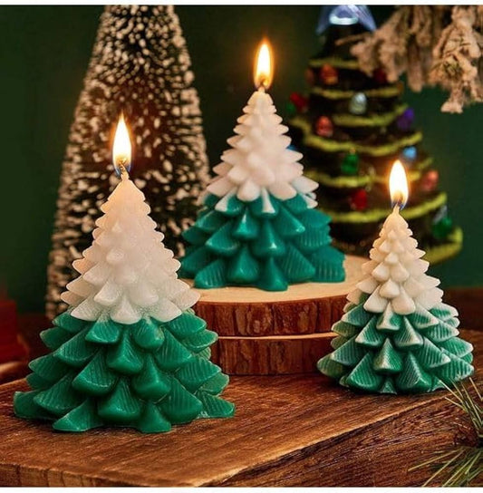 Christmas tree-shaped candle with detailed branches, glowing warmly