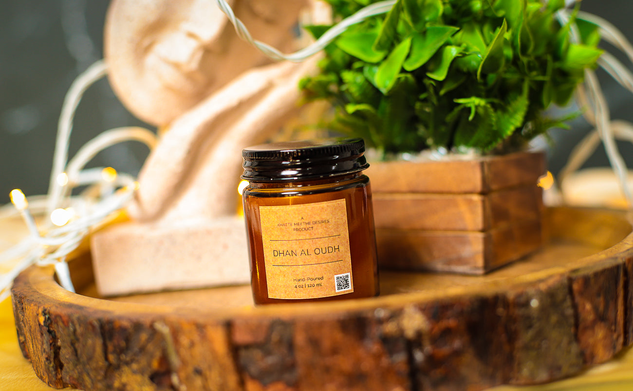 A glowing amber candle beside a bath, creating a spa-like relaxation