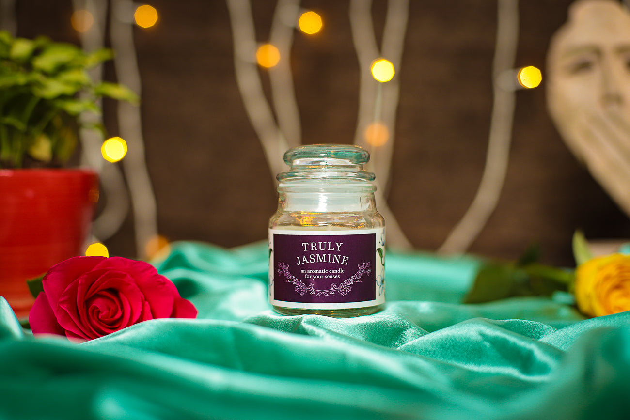 Soothing Jasmine Aroma Candle, filling the space with a calming floral scent