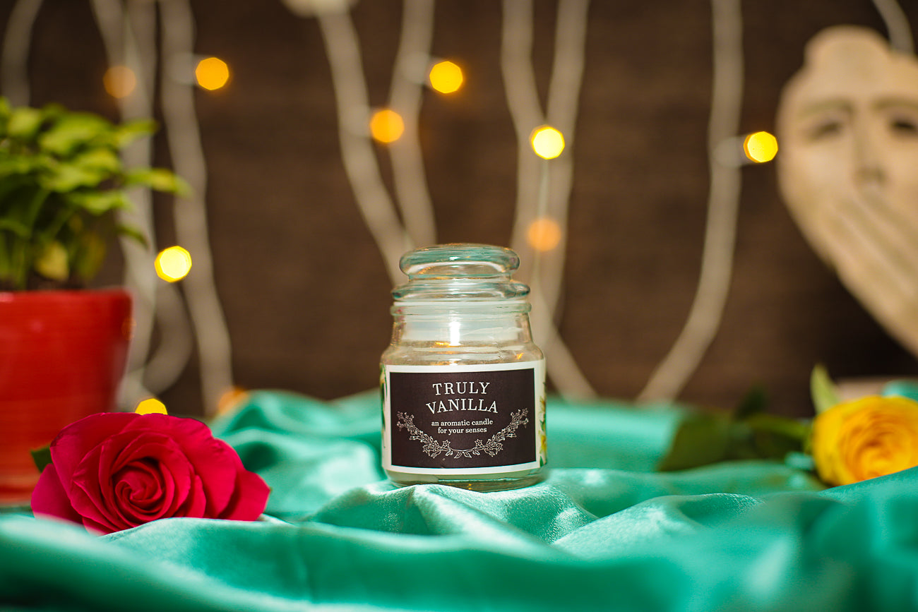 A soothing Vanilla Aroma Candle, filling the air with a warm and comforting fragrance