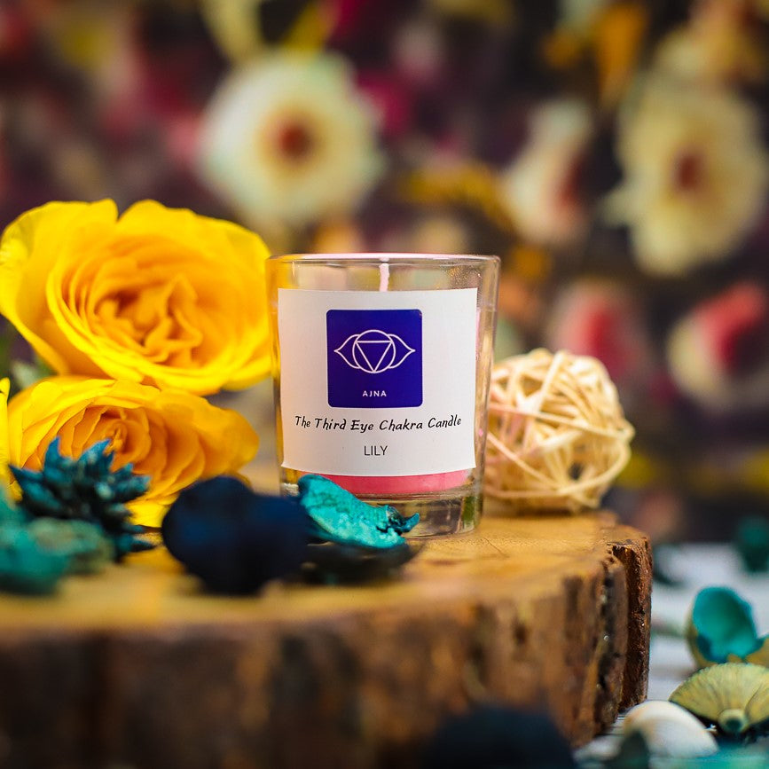 A beautifully designed chakra candle set with intricate mandala patterns