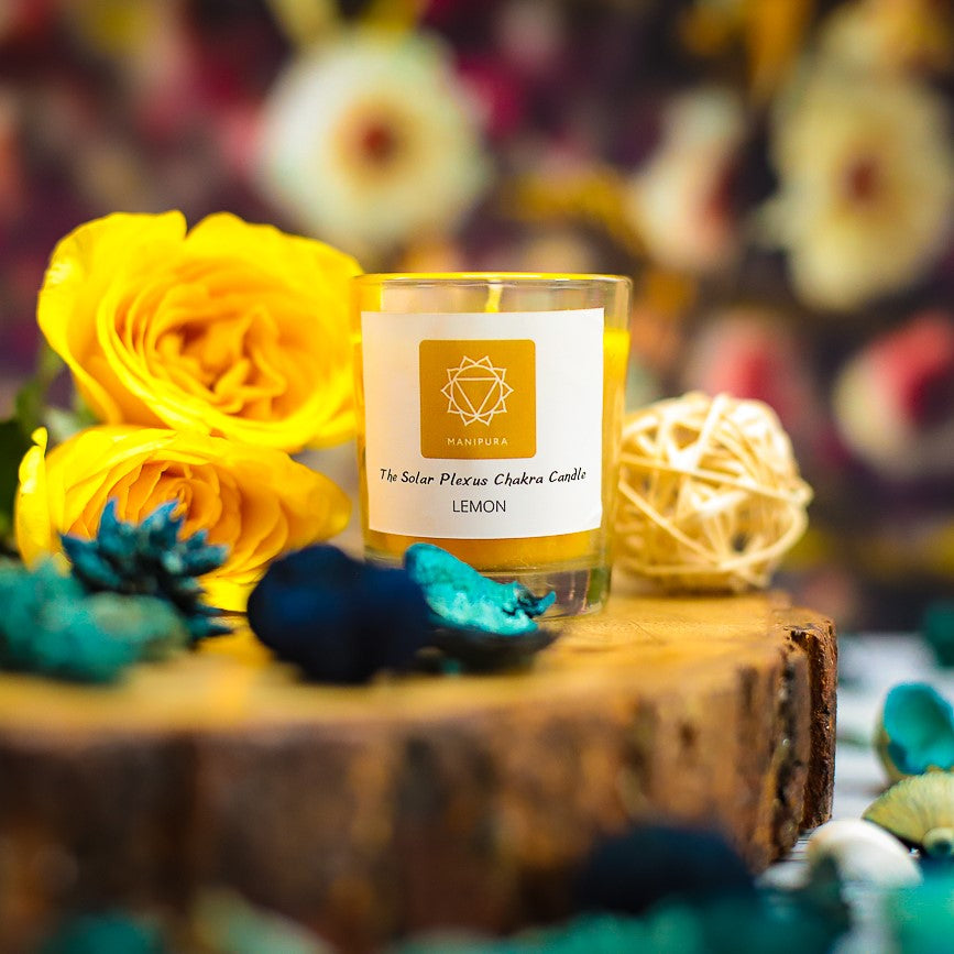 A vibrant Root Chakra candle, grounding energy and providing stability