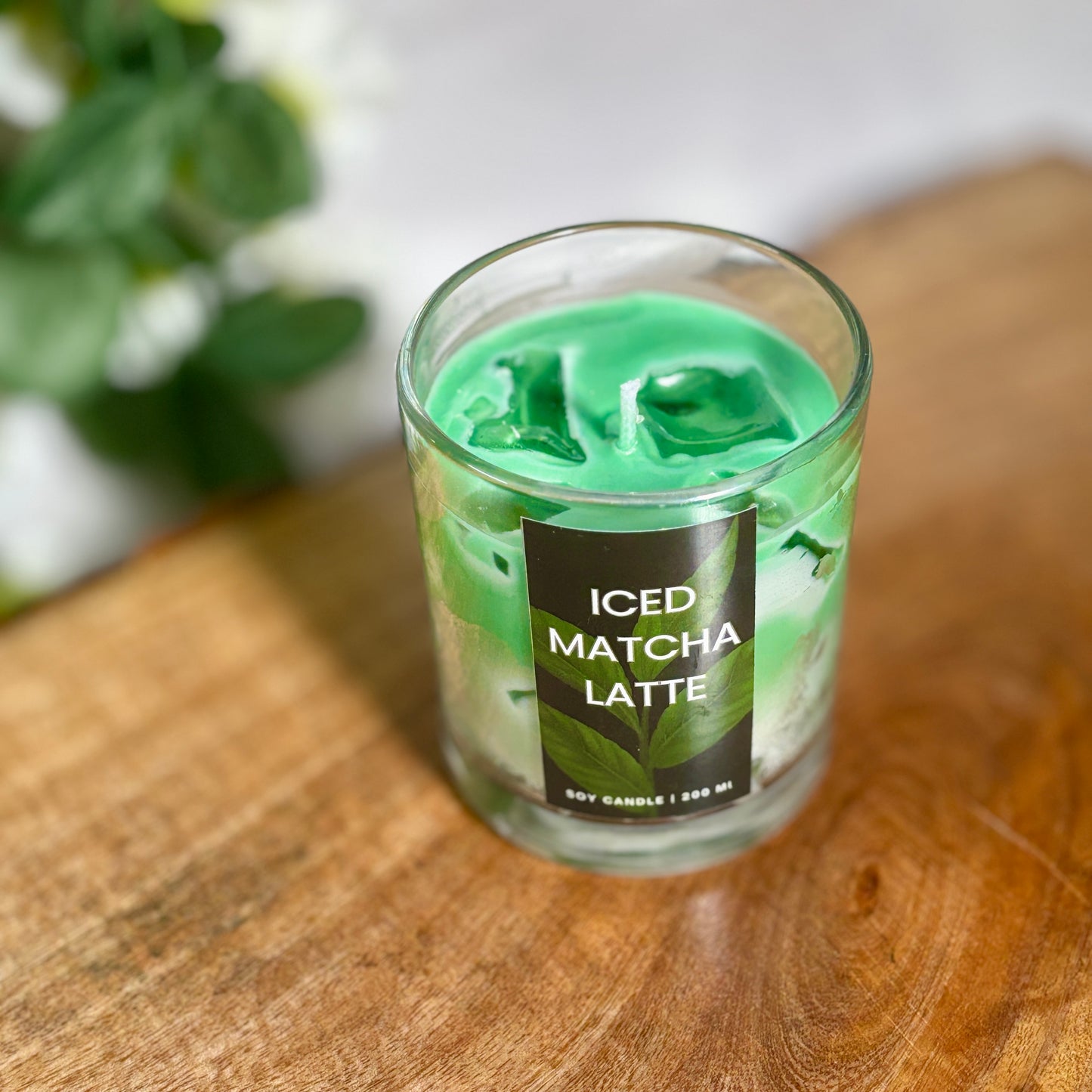 A Matcha Tea Candle releasing a warm, herbal aroma, recreating the atmosphere of a tea shop