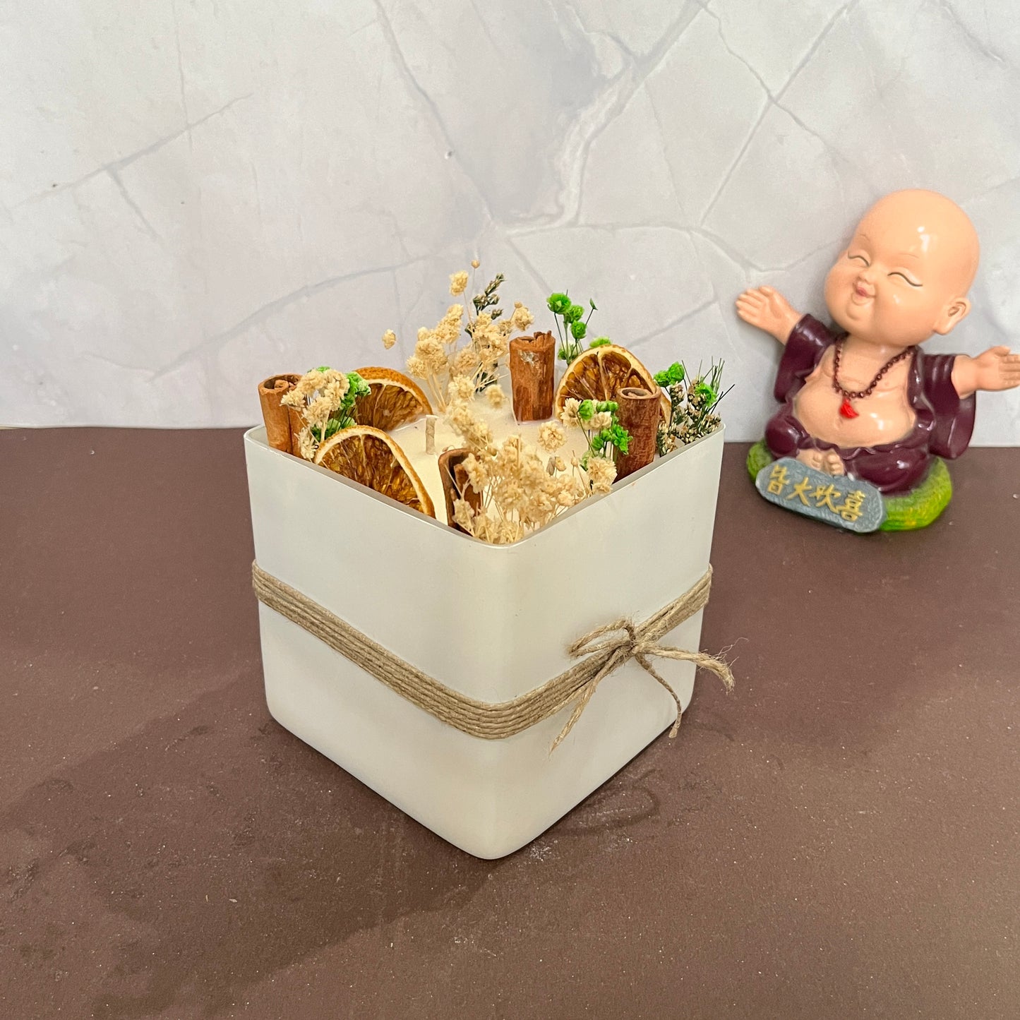 Beautifully crafted Forest Candle glowing softly in a serene setting