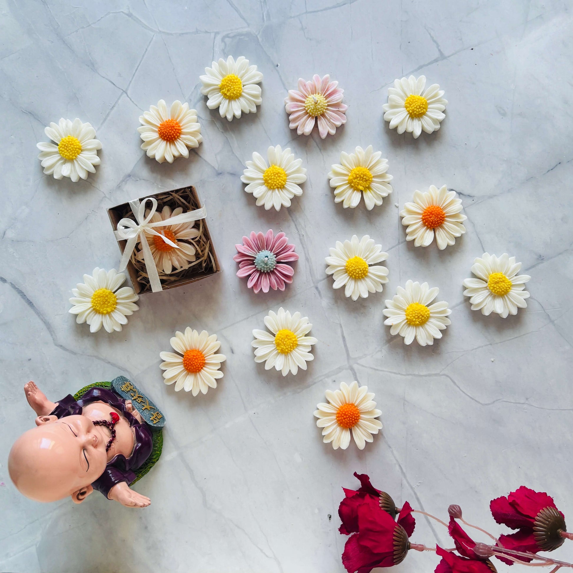 Handcrafted daisy candle symbolizing purity and positivity