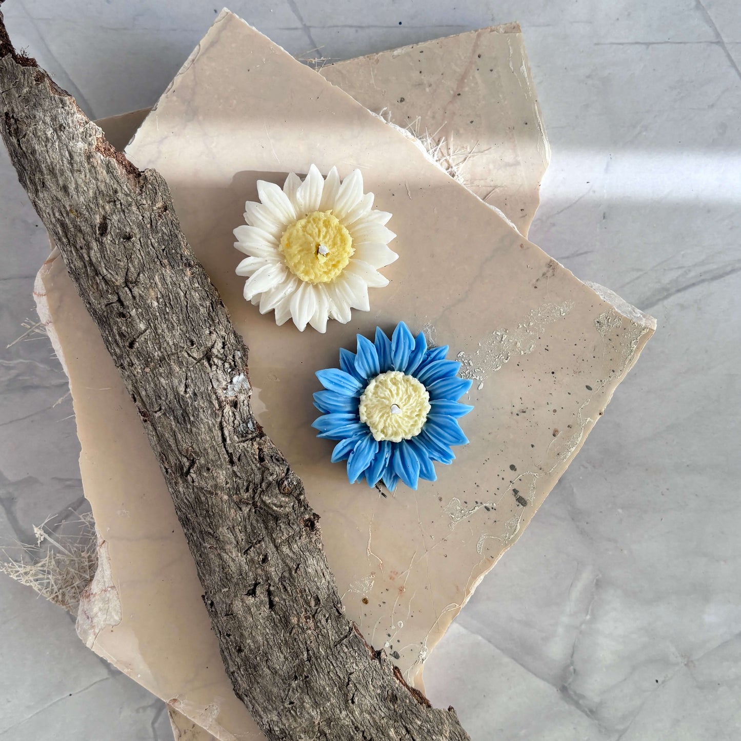 Hand-poured sunflower candle with vibrant colors and a soothing aroma