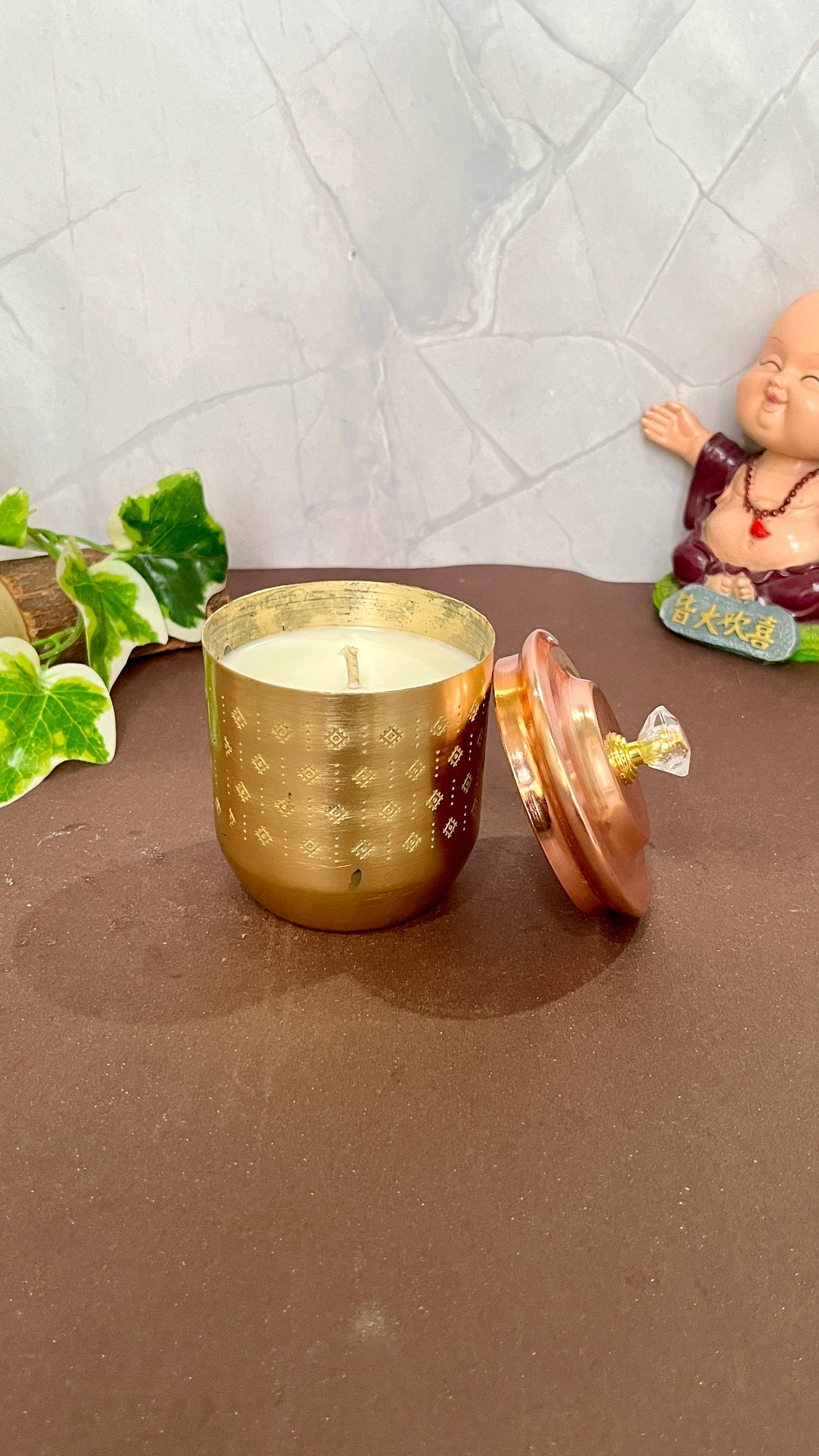 Handcrafted Ujiyaara Candle, glowing with soft light and infused with a soothing aroma for peaceful moments.