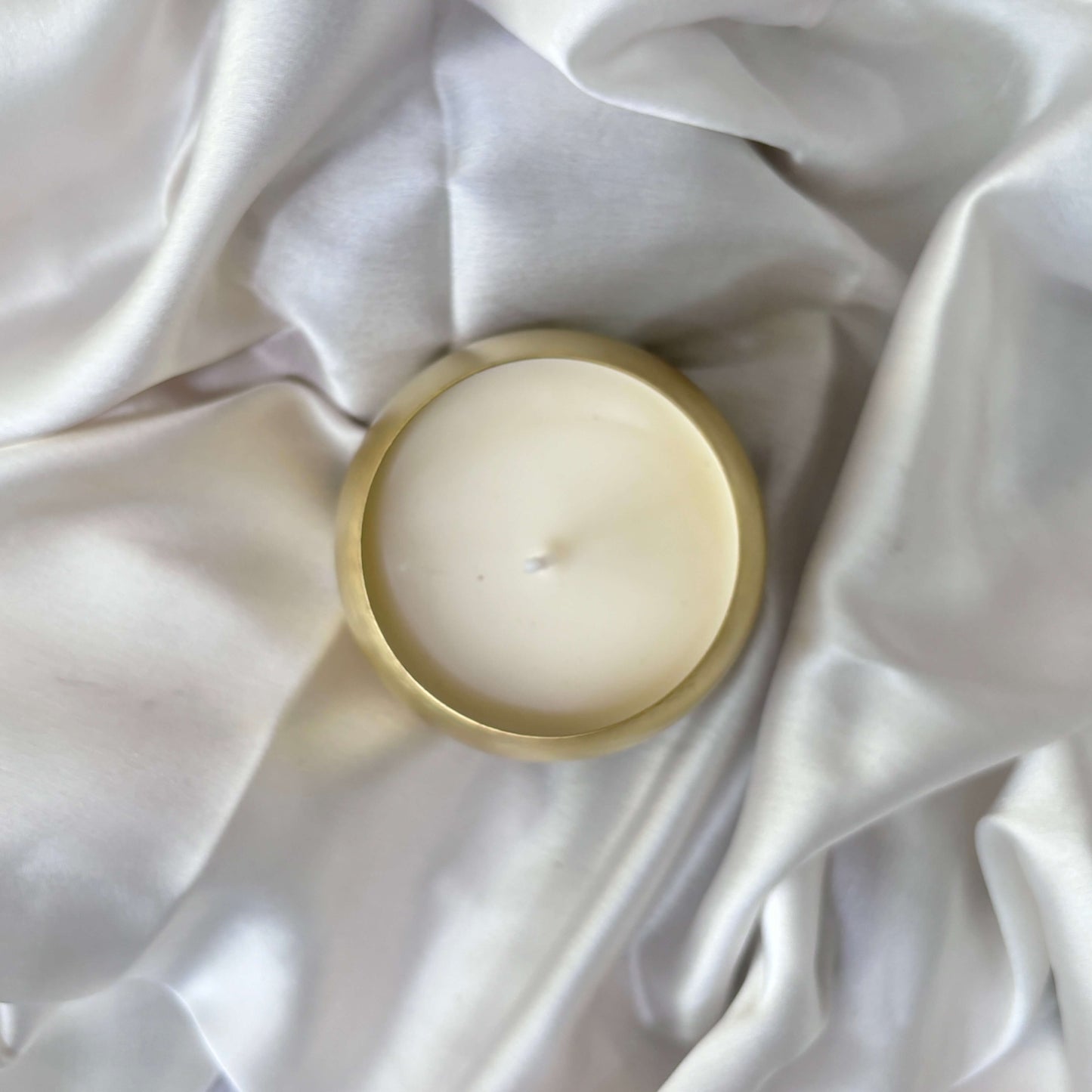 Kansora Candle with a rich, earthy aroma and elegant design, crafted to create a warm and serene ambiance in any space