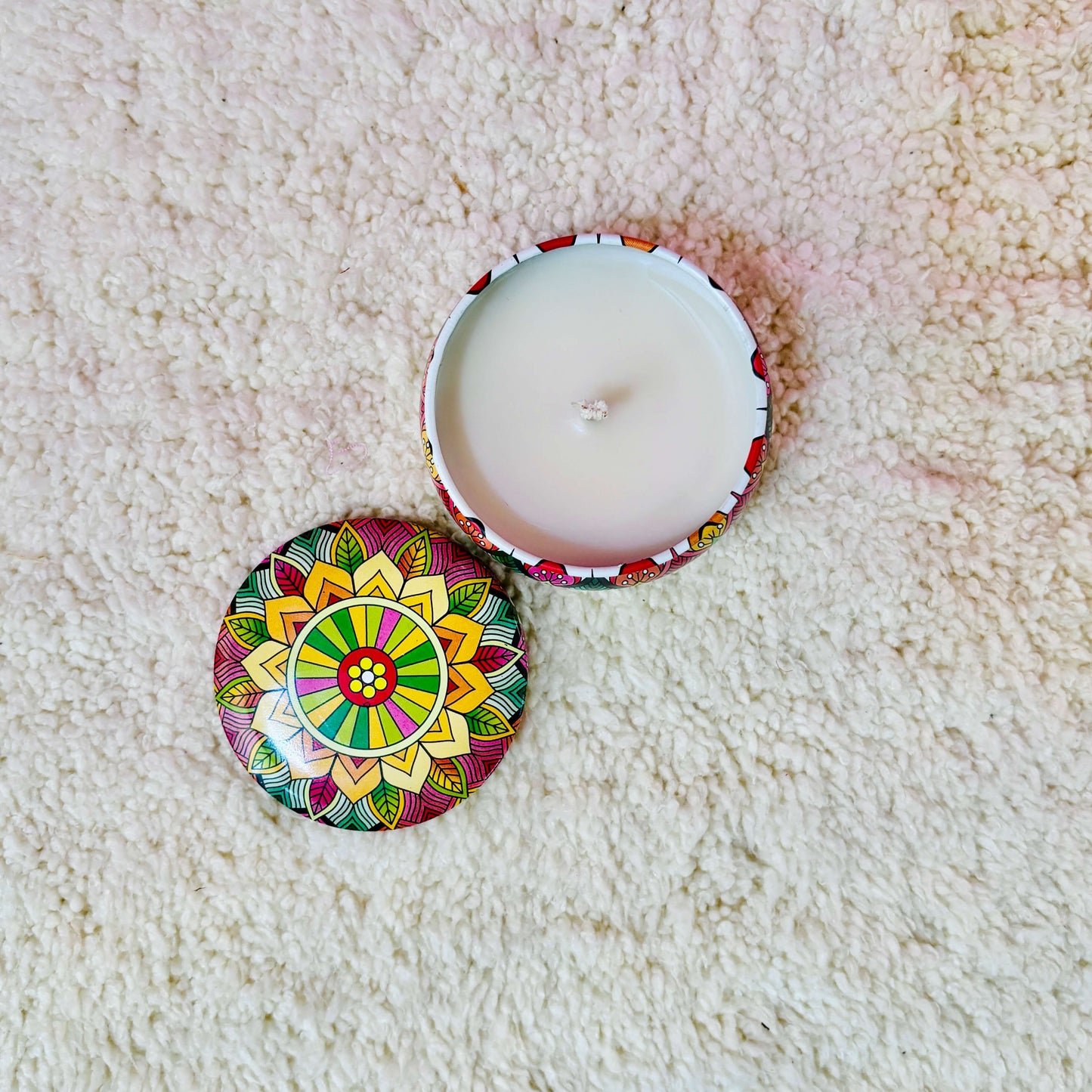Serene Mandala Illume Candle, casting intricate mandala shadows on the walls