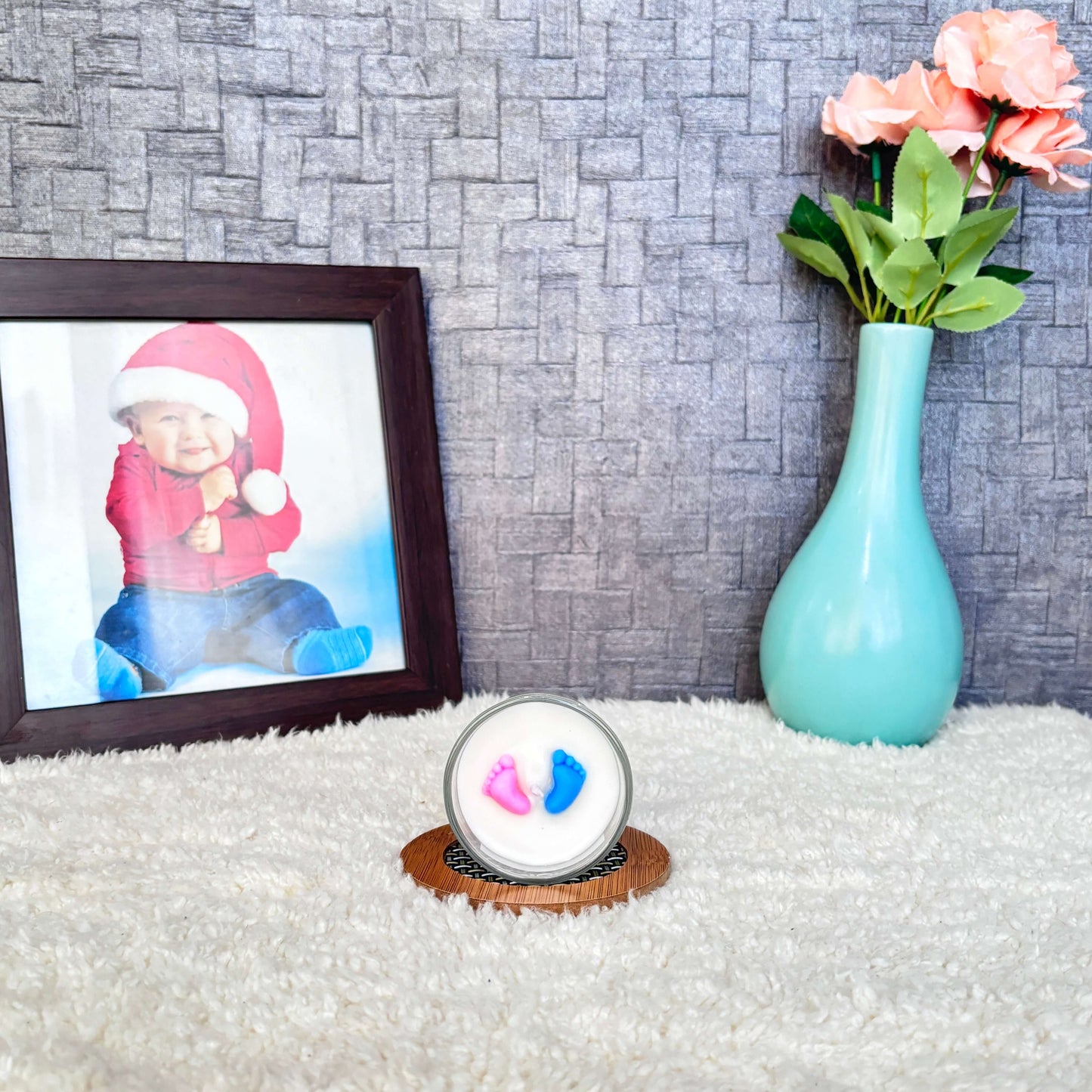 Scented votive candle in a decorative glass – a charming baby shower keepsake