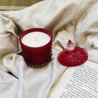 A luxurious Prism Fine Fragrance Candle, placed on a marble tray for an elegant display