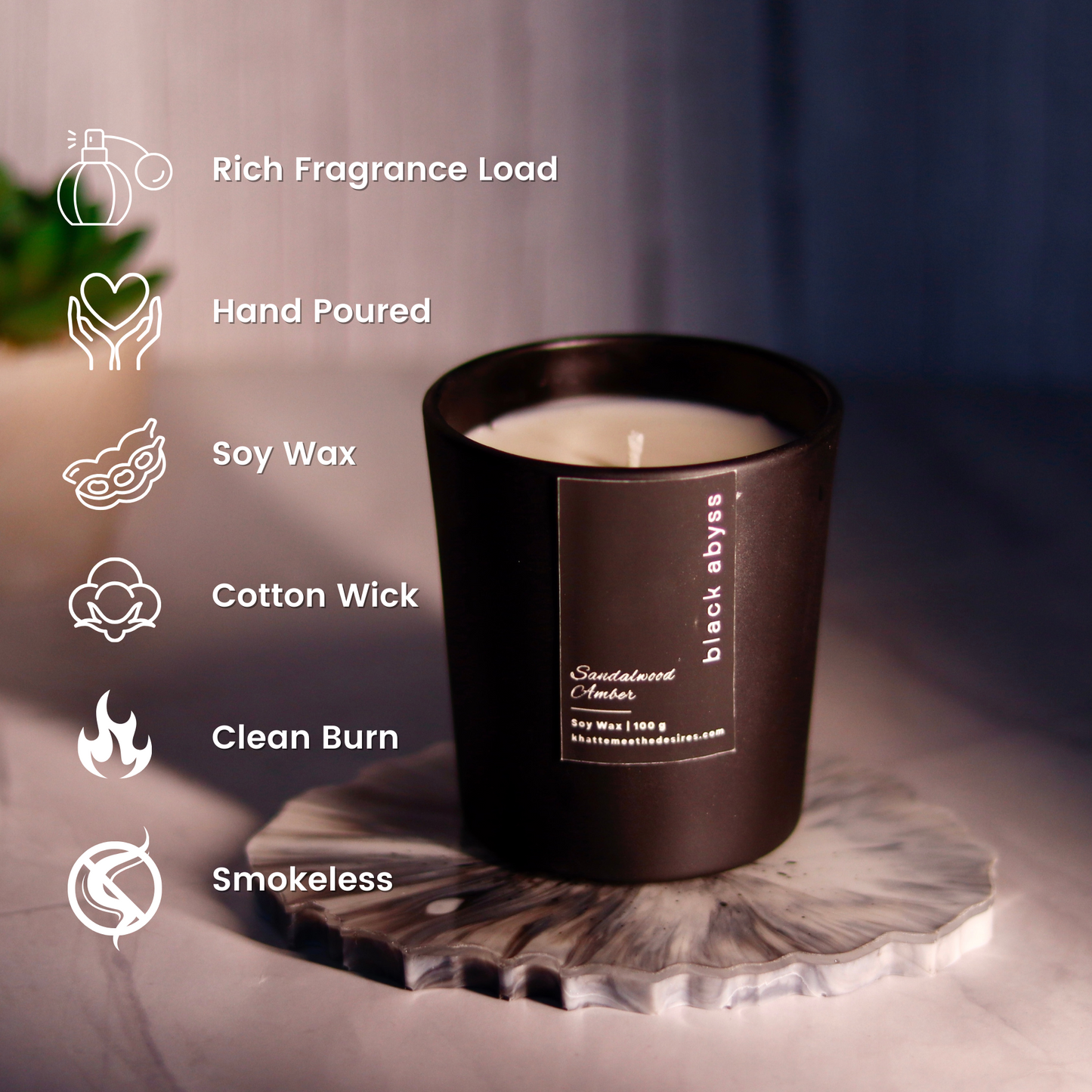 Abyss candle with a slow-burning wick, casting deep shadows for a dramatic ambiance