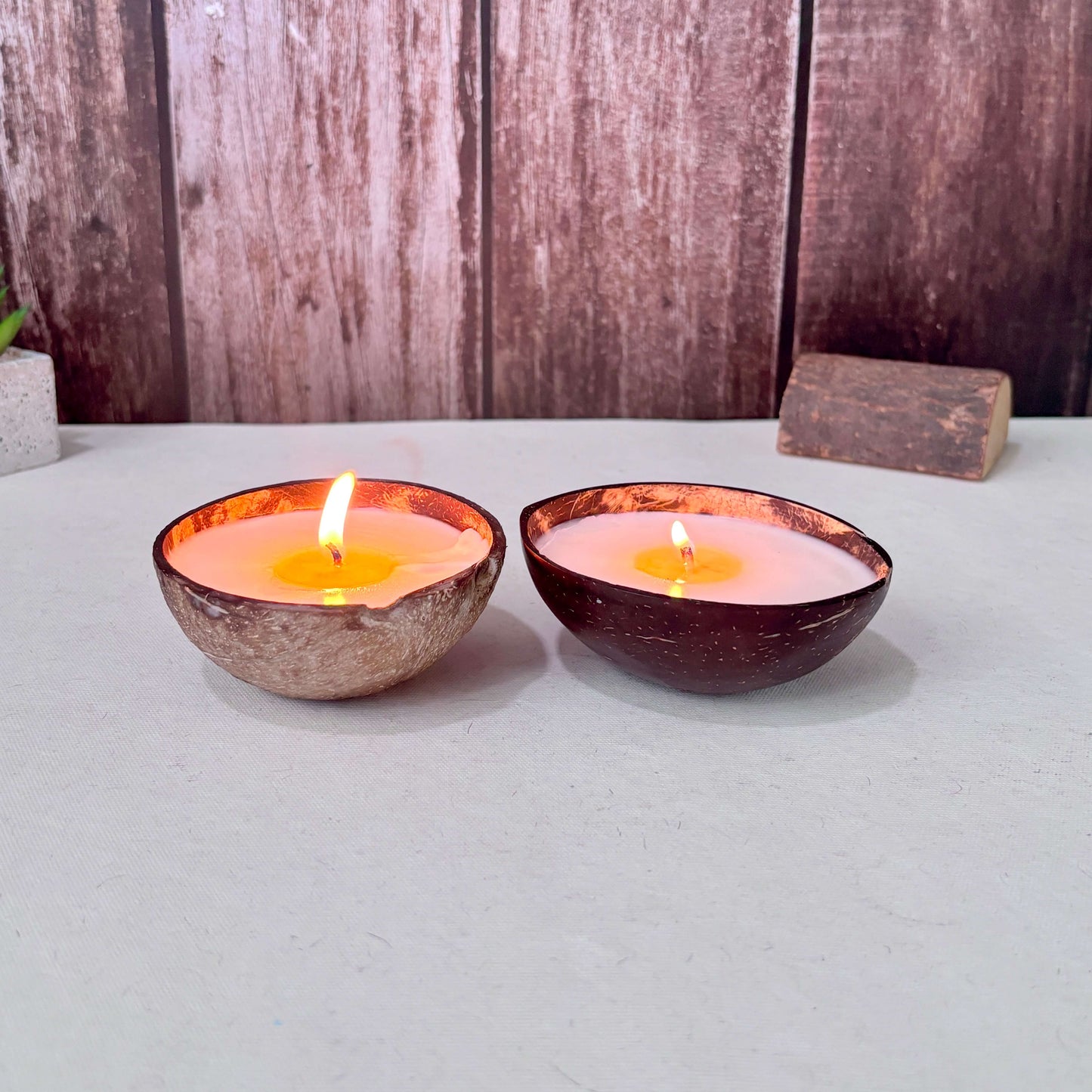 Hand-poured candle in a natural coconut shell