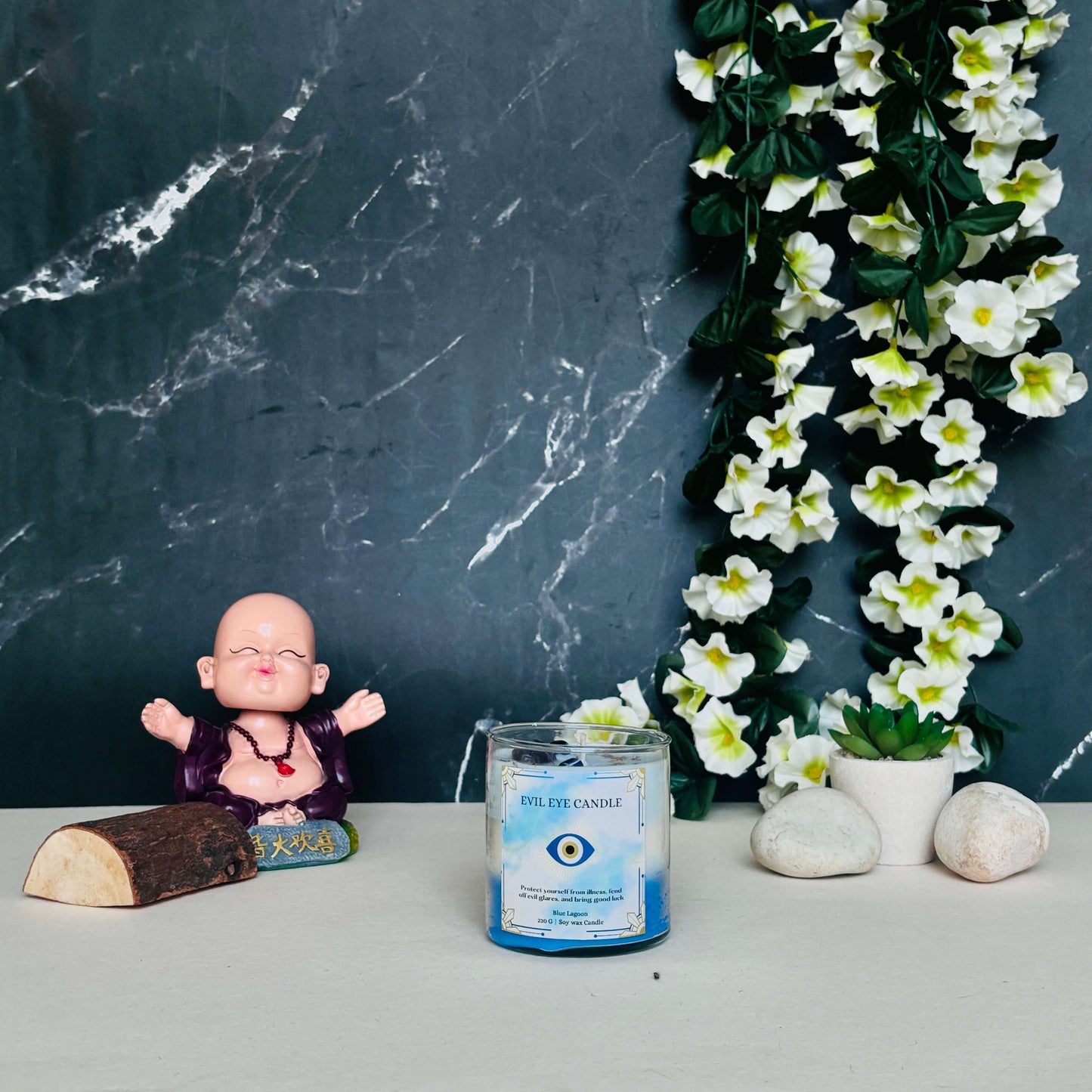 Luxurious Evil Eye Candle in a glass jar, perfect for warding off negativity