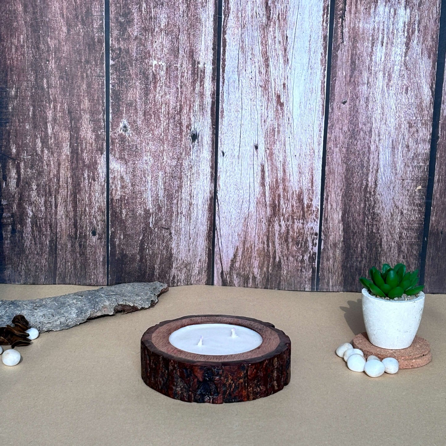 Warm, cozy candle in a rustic bark vessel