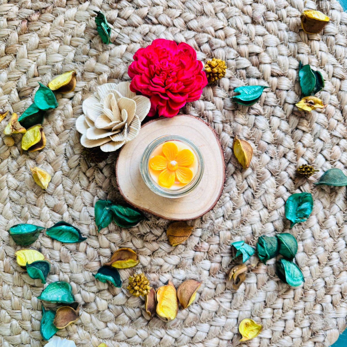 Gowing Kenzo Flower Garden Candle in a gold-accented jar, adding an elegant touch