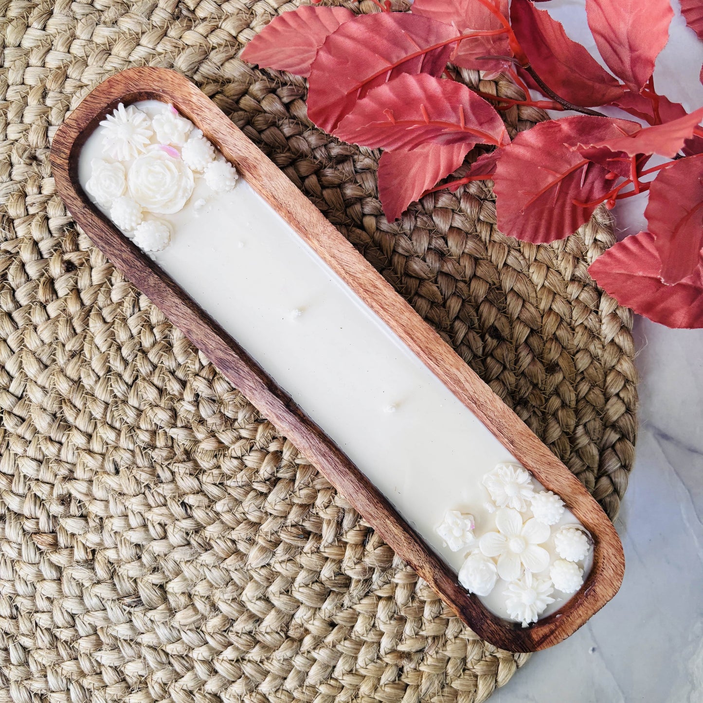 Warm, earthy timber-scented candle