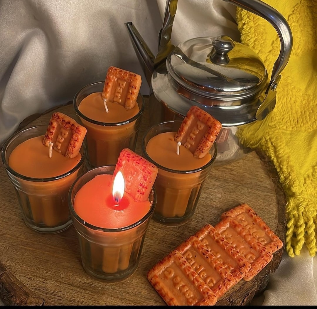 Soft-glowing Chai Biscuit Candle, perfect for relaxing evenings and tea rituals.