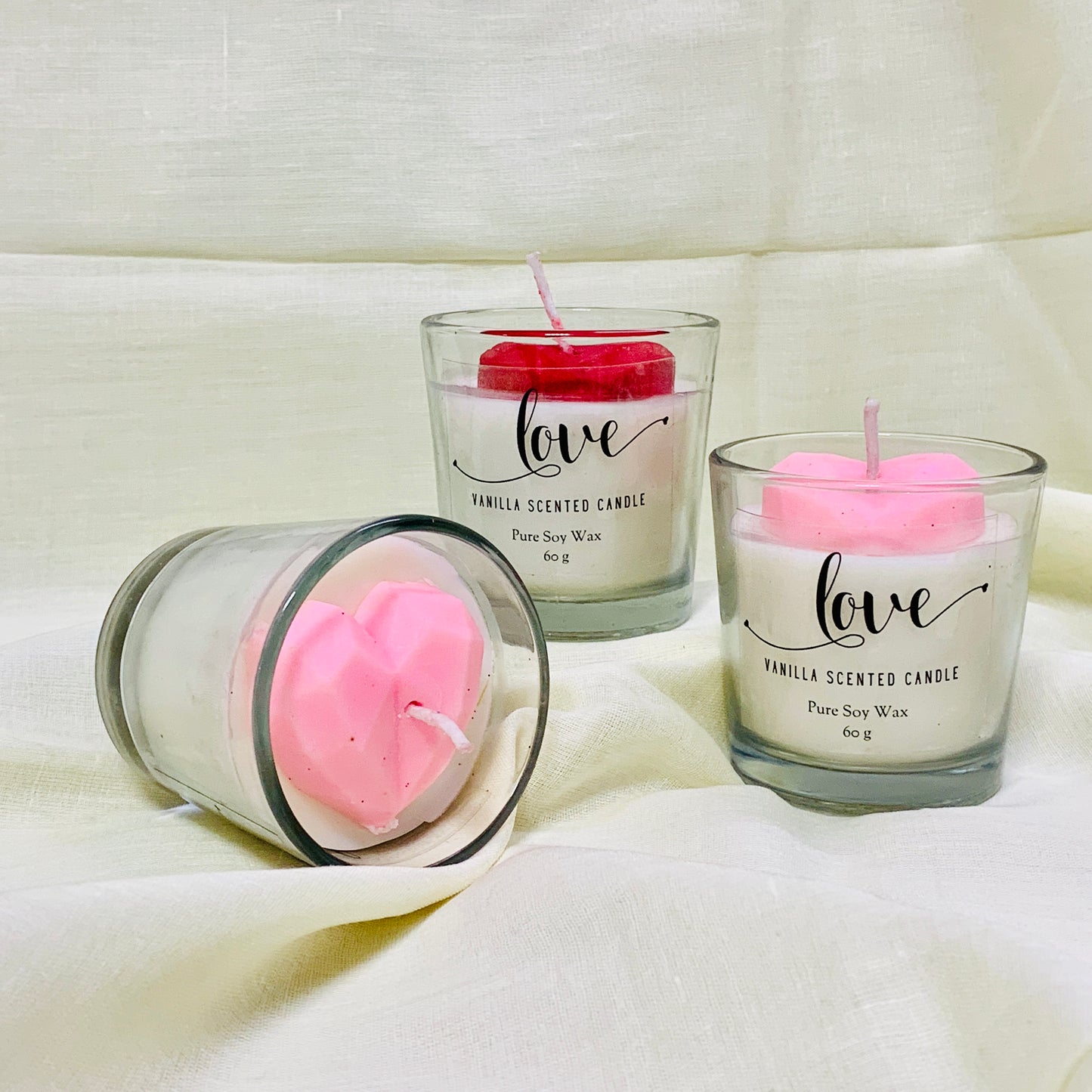 Set of 2 heart-shaped votive candles with a warm vanilla scent, perfect for gifts or cozy vibes