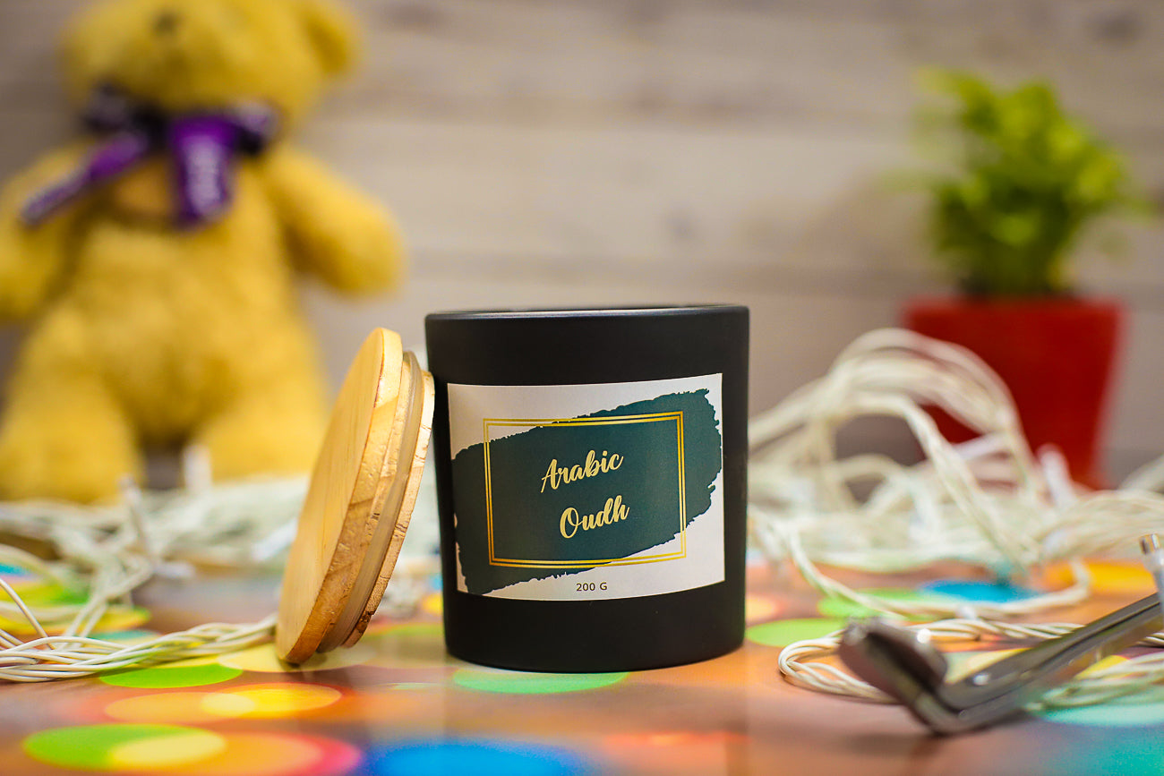 A richly scented Midnight Flame Candle, filling the room with an inviting aroma